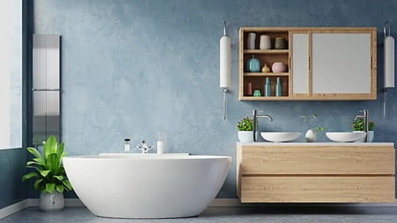 Modern remodeled bathroom with freestanding tub and floating vanity